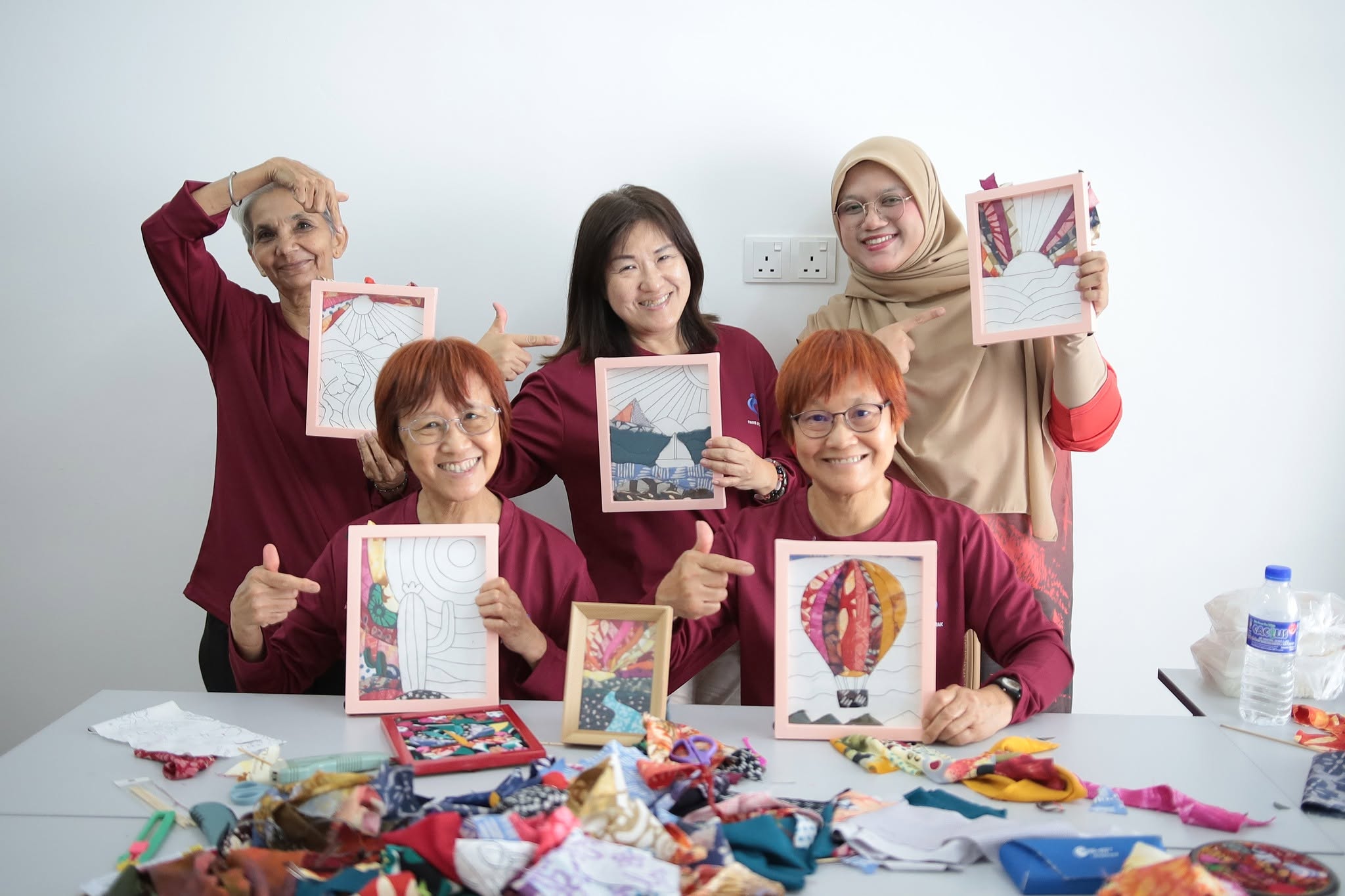 Participants working together at a guided craft session run by Ruang Karya